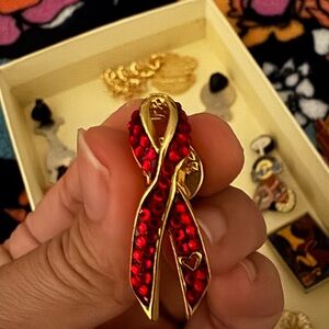 Elegant Red and Gold Ribbon Brooch